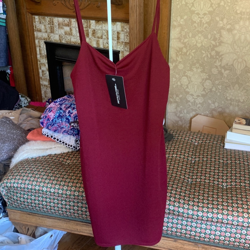 Burgundy strappy straight neck bodycon dress . NWT‎